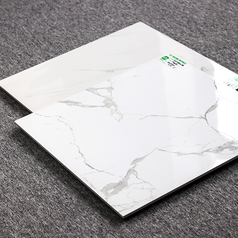 กระเบื้องพื้น Porcelain 600x600 เคลือบเงา Carrara White Marble Look Design
