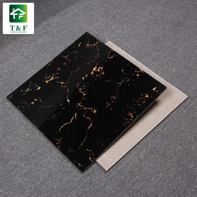 กระเบื้องพื้นพอร์ซเลนขัดเงาเคลือบ 600x600 สีดำและสีทองดอกไม้